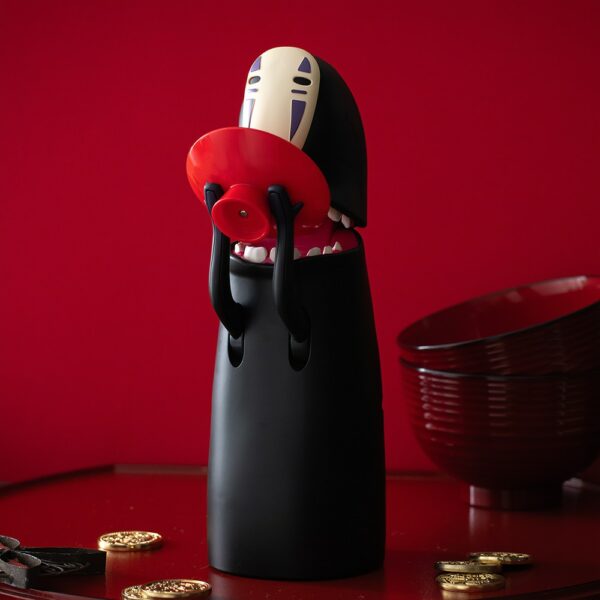 The Spirited Away No Face Munching Piggy Bank