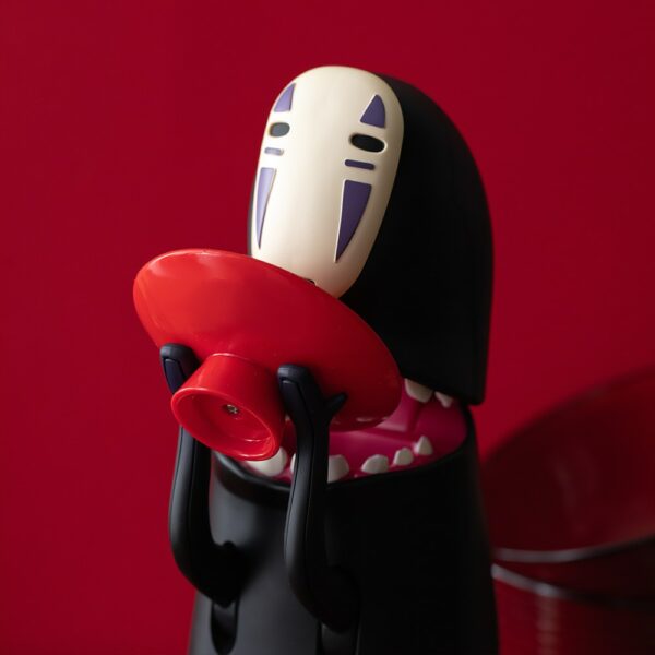 The Spirited Away No Face Munching Piggy Bank