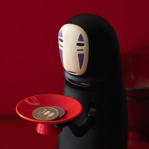 The Spirited Away No Face Munching Piggy Bank