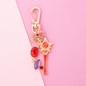 This bag charm is based on the Star Power Stick and features a sparkling stone design.